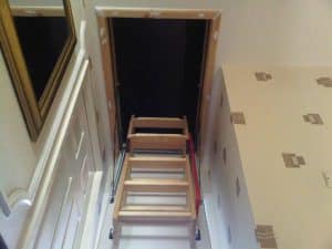 wooden loft ladder half extended