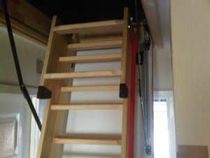 Wooden loft ladder half extended